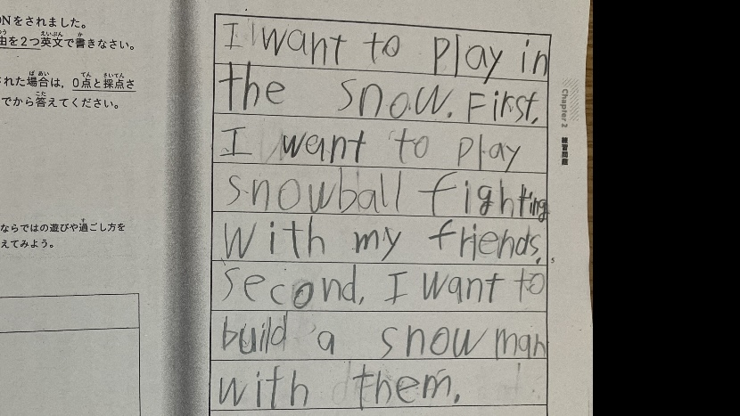 英検3級ライティング問題に挑戦した小学生の手書き英文例「I want to play in the snow.」
